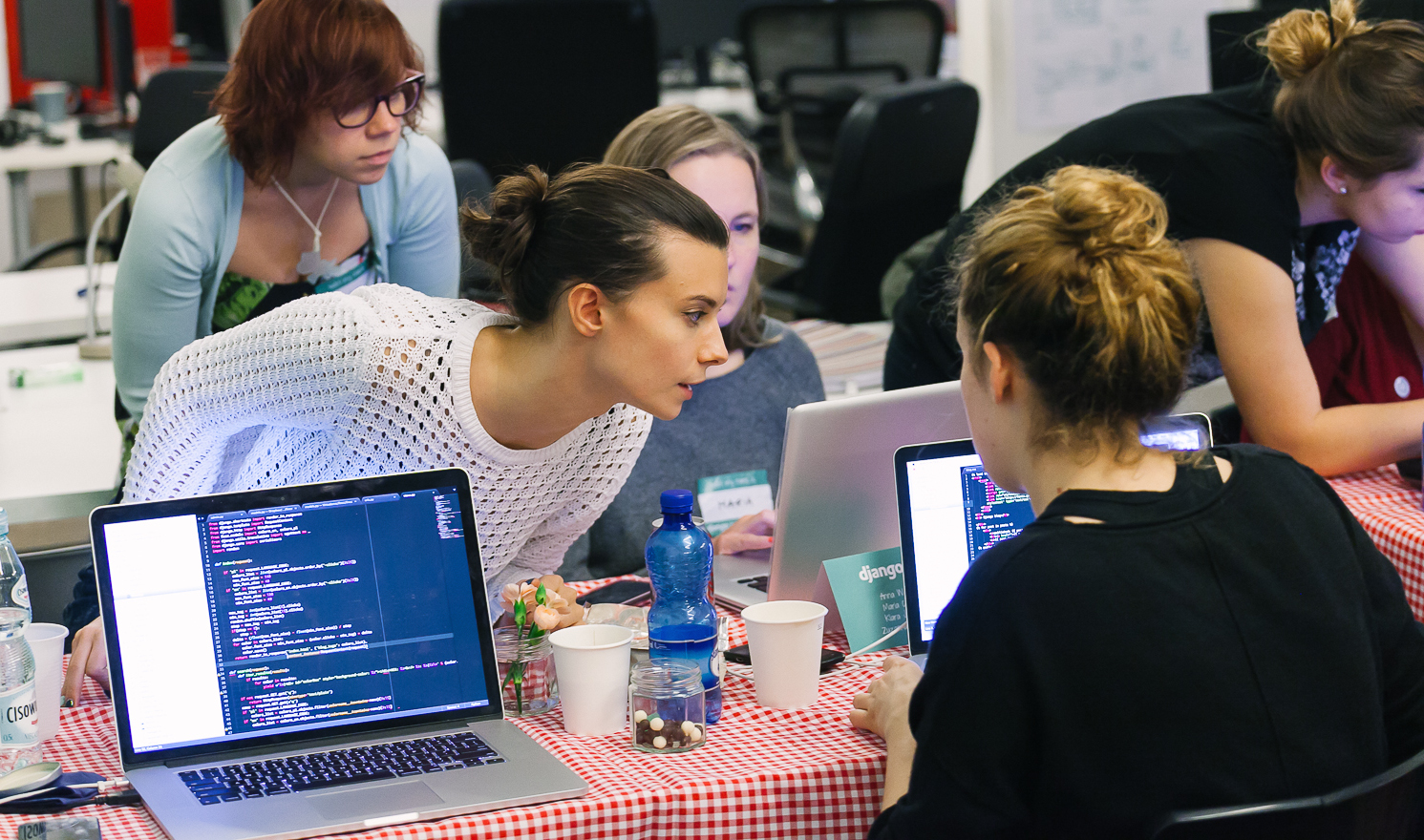 Women coding Django Girls